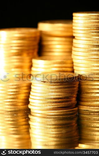 golden piles of coins macro background