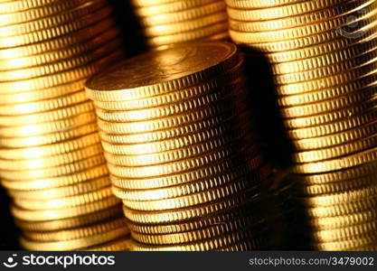 golden piles of coins macro background