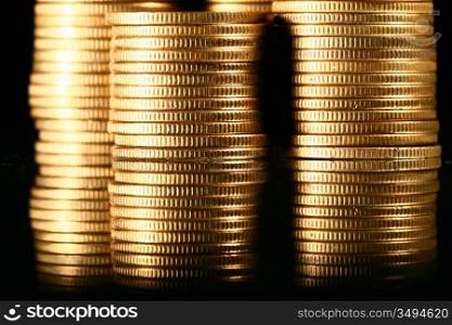 golden piles of coins macro background