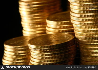 golden piles of coins macro background