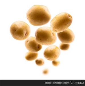 Golden potatoes levitate on a white background.. Golden potatoes levitate on a white background
