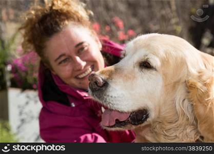 Golden Retriever with her owner enjoying a great day
