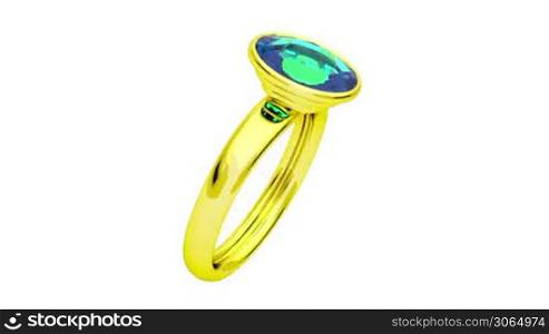 Golden ring with green diamond