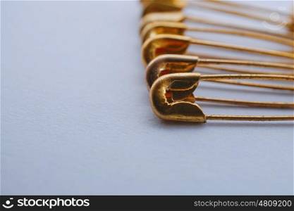 golden safety pin