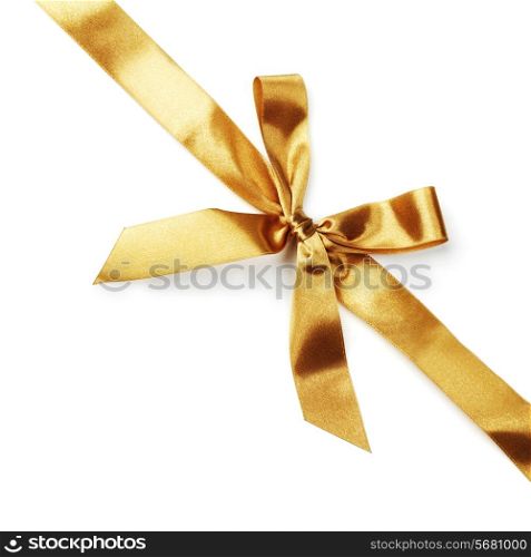 Golden satin gift bow ribbon isolated on white
