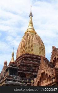 Golden spire of old pagoda in Bagan, Myanmar
