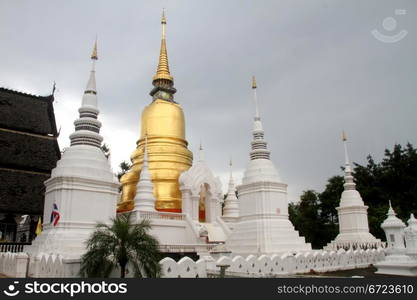 Golden stupa and big temple in Wat Suan Dok, Chiang Mai, Thailand