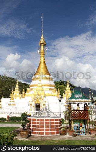 Golden stupa and well in Wat Chong Klang, Mae Hong Son