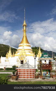 Golden stupa and well in Wat Chong Klang, Mae Hong Son