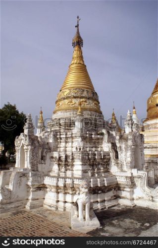 Golden stupa in Maha Aungmye Bonzan monastery in INwa, Mandalay, Myanmar