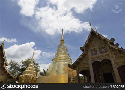 golden stupa pagoda and sanctuary in buddhism temple in Thailand