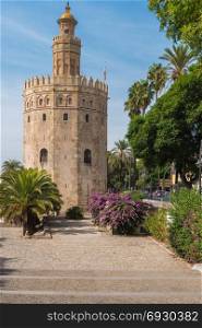 Golden tower or Torre del Oro along the Guadalquivir river, Seville, Andalusia, Spain