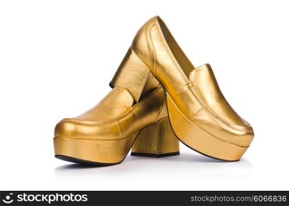 Golden woman shoes isolated on the white