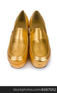 Golden woman shoes isolated on the white