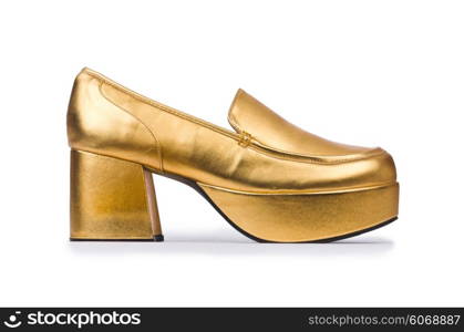 Golden woman shoes isolated on the white