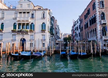 goldola boat parking in front of building in grand canal Venice Italy