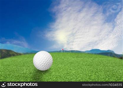 Golf ball on grass nature background