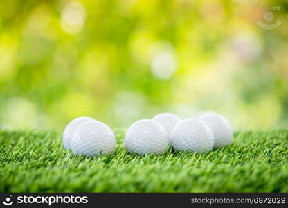 golf ball on green grass