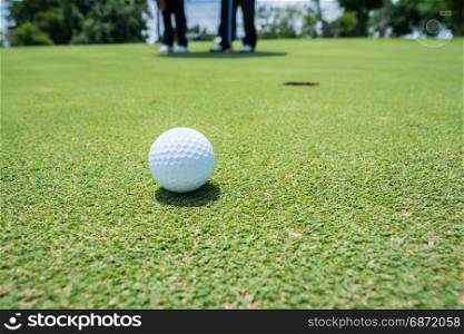 golf ball on putting green