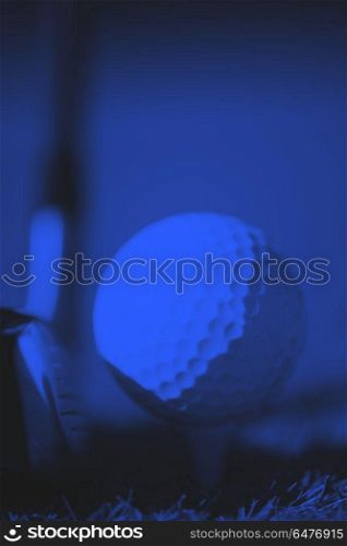 golf club and ball in grass. golf club and ball in grass on course preparing for shot duo tone