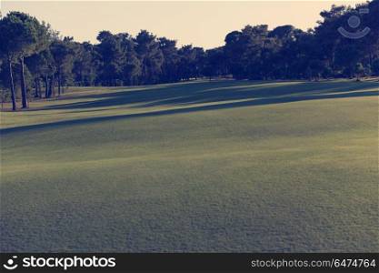 golf course with fresh green grass at beautiful sunny day. golf course on sunny day