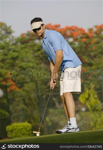 Golfer about to strike