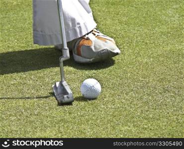 Golfer aiming for the last putting stroke