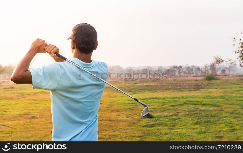 Golfer finishing his driver swing