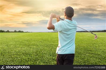 Golfer finishing his driver swing