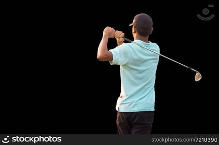 Golfer finishing his driver swing on black background
