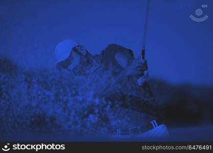 golfer hitting a sand bunker shot. golf player shot ball from sand bunker at course duo tone