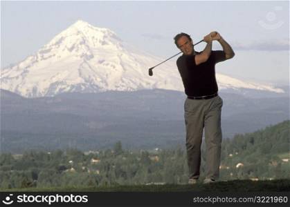 Golfer Silhouette and Mt. Hood
