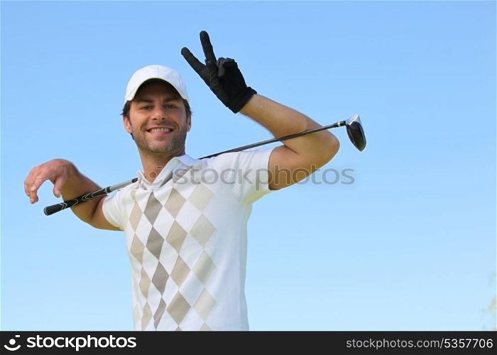 Golfer smiling