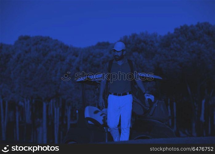 golfer walking and carrying golf bag. handsome middle eastern golfer carrying golf bag and walking at course to next hole duo tone