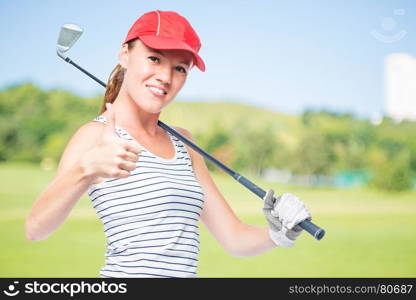 Golfer young and successful with golf club on a background of golf courses, right space