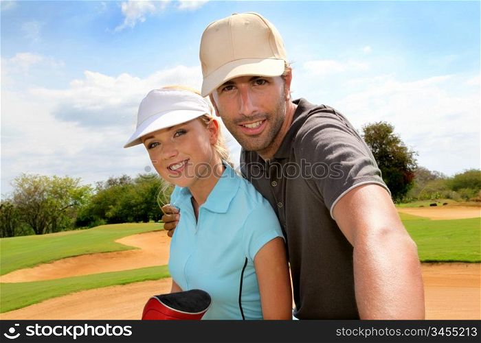 Golfers on golf course