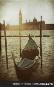 Gondola and San Giorgio Maggiore church on Grand Canal in Venice. Photo in grunge style