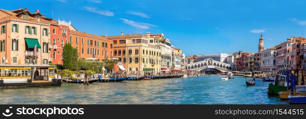 Gondola at the Rialto bridge in Venice, in a beautiful summer day in Italy