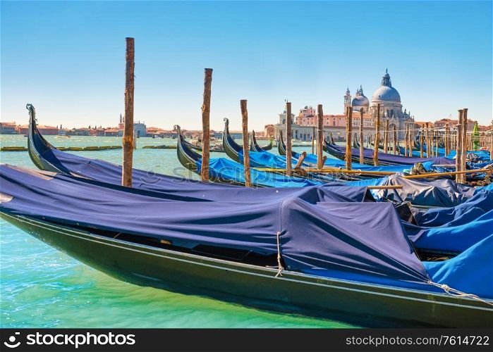 Gondola in front on basilica on grand canal in Venice, Italy