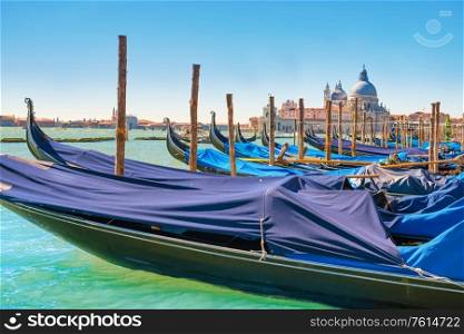 Gondola in front on basilica on grand canal in Venice, Italy