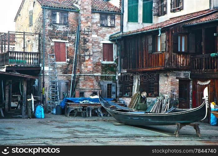 Gondola waiting for repair in workshop,Venice