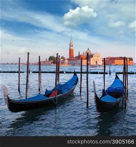 Gondolas and San Giorgio Maggiore church on Grand Canal in Venice