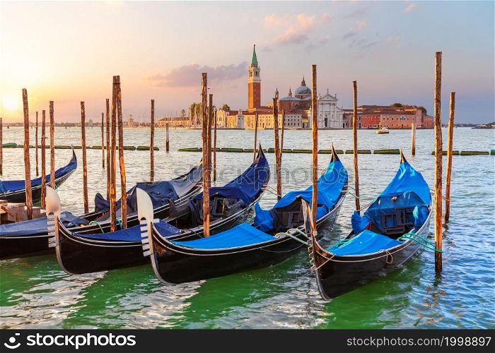 Gondolas and St. George Monastery in the background, Venice, Italy.. Gondolas and St. George Monastery in the background, Venice, Italy