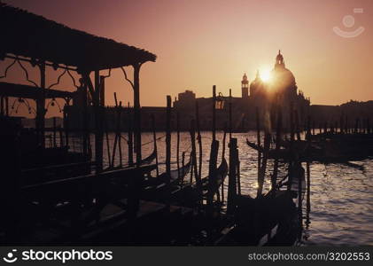 Gondolas moored at a dock, Italy