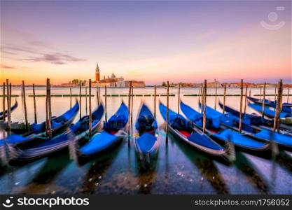 Gondolas with San Giorgio di Maggiore church in Venice, Italy