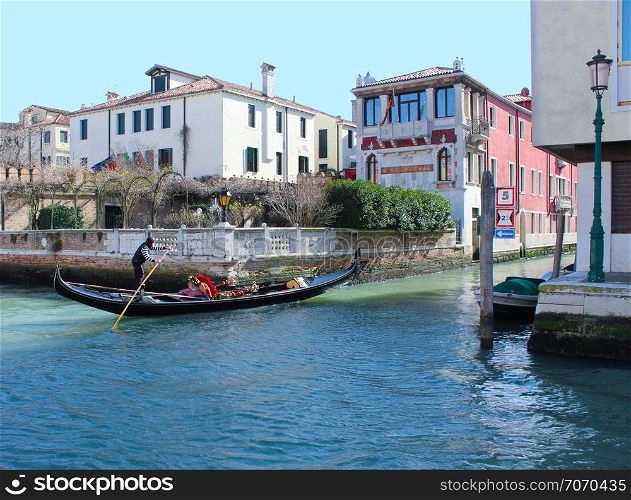 Gondolier On Grand Canal, gondola in movement on Grand Canal in Venice, Italy