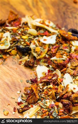 Good cuisine. Closeup colored spices for pasta mix on wooden rustic table background