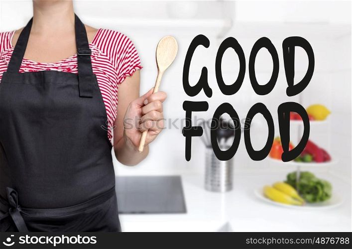 good food cook holding wooden spoon background concept.