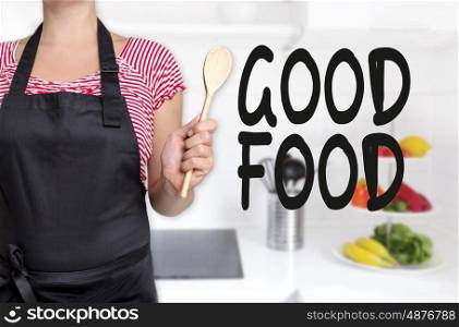 good food cook holding wooden spoon background concept.