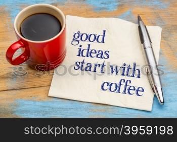 Good ideas start with coffee - handwriting on a napkin with a cup of coffee